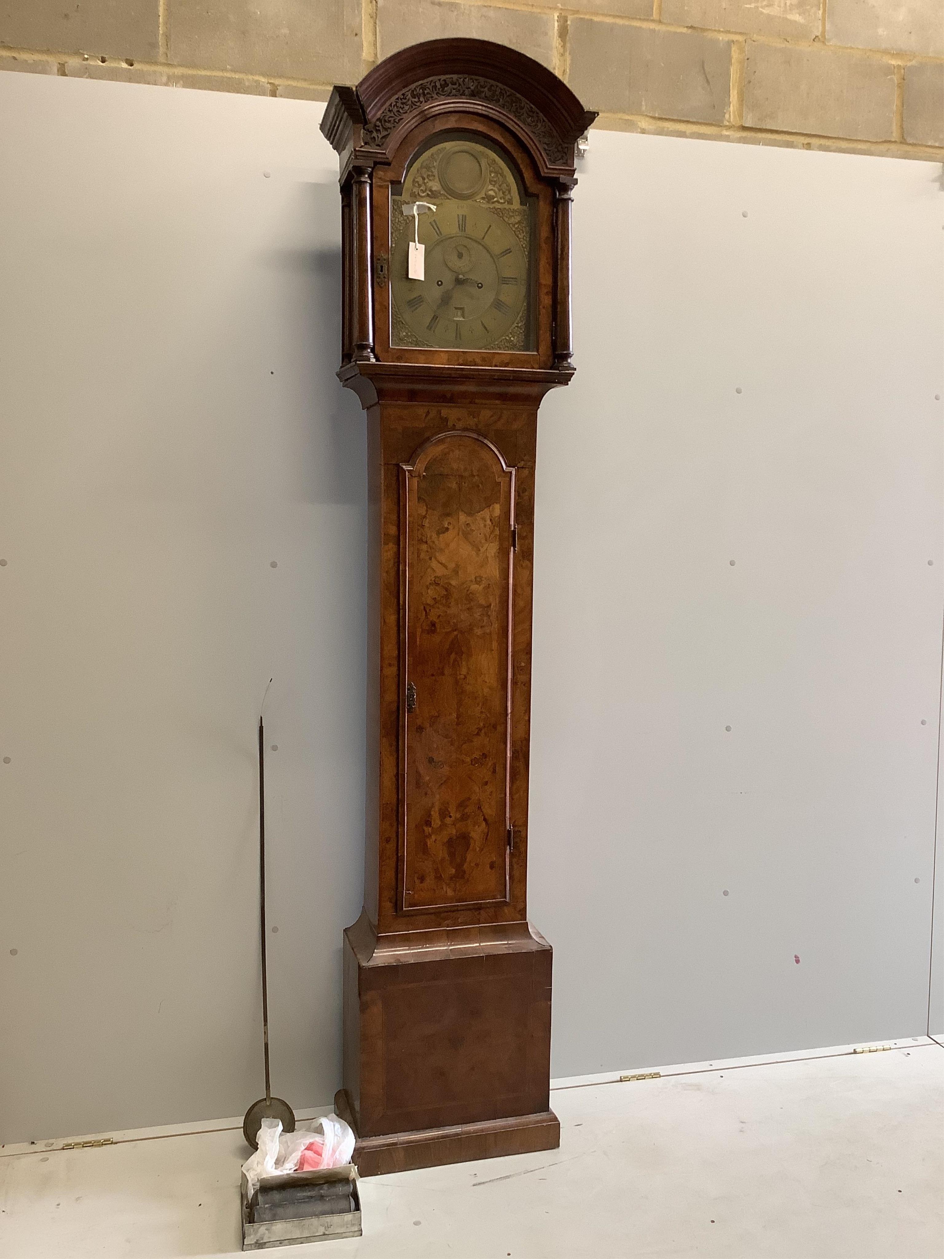 A George II walnut and feather banded longcase clock, Christopher Pinchbeck, London, height 237cm. Condition - poor
